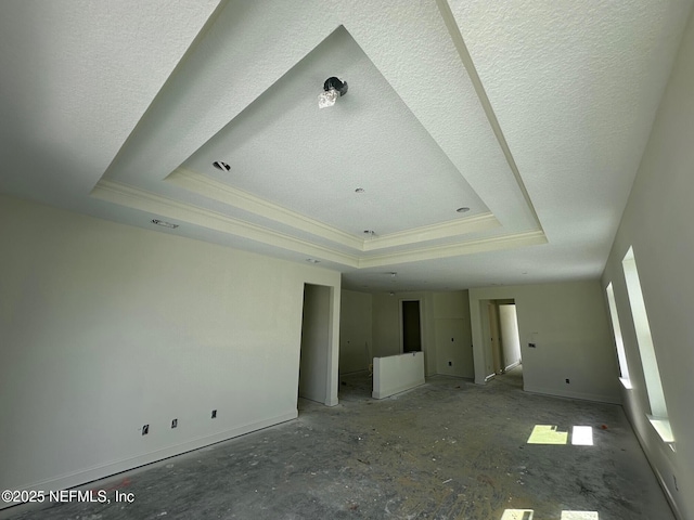 36 Aspendale Rd, Ponte Vedra, FL 32081 - unfurnished bedroom with a raised ceiling, crown molding, and a textured ceiling