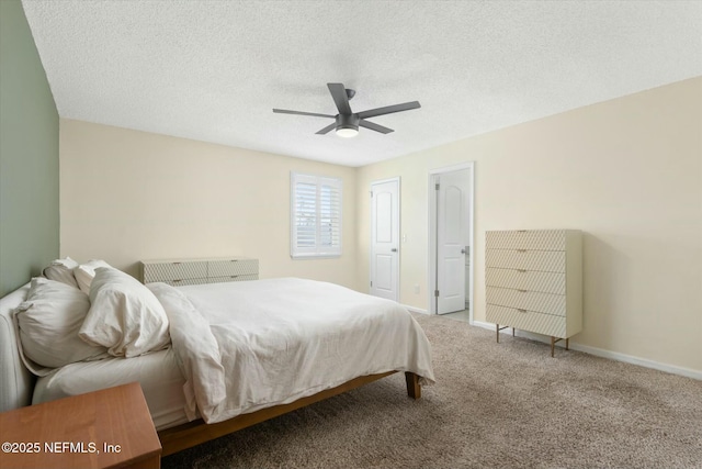 bedroom featuring carpet floors, ceiling fan, baseboards, and a textured ceiling