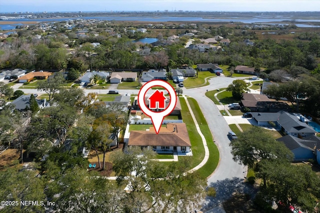 aerial view featuring a residential view and a water view