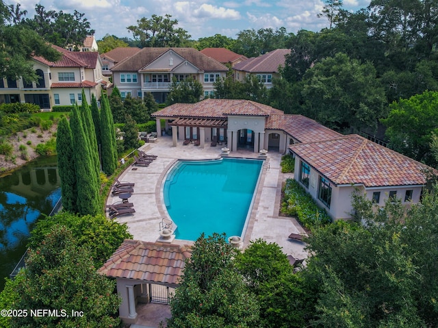 pool with a patio area