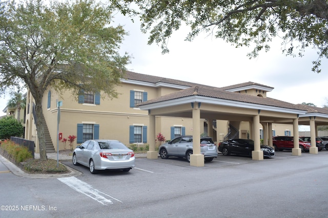 partially covered parking lot with stairs