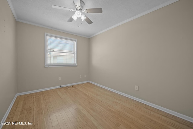 2107 2nd St S, Jacksonville Beach, FL 32250 - unfurnished room with crown molding, baseboards, ceiling fan, light wood-style flooring, and a textured ceiling