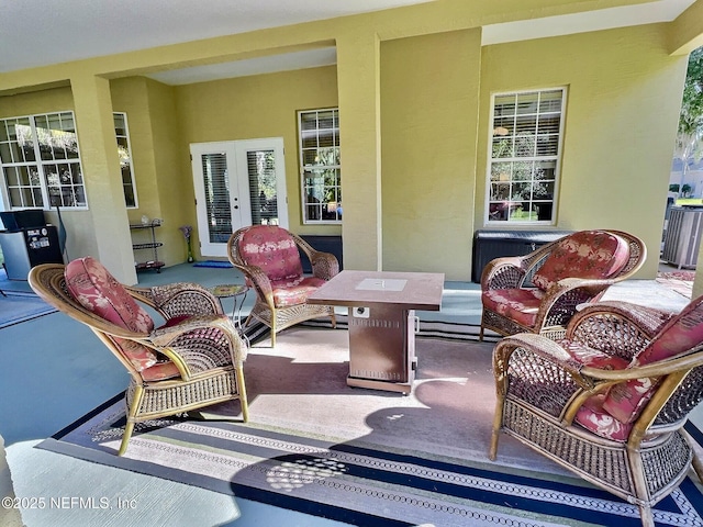 view of patio with french doors and outdoor lounge area