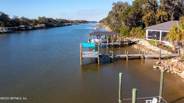 view of dock featuring a water view and boat lift