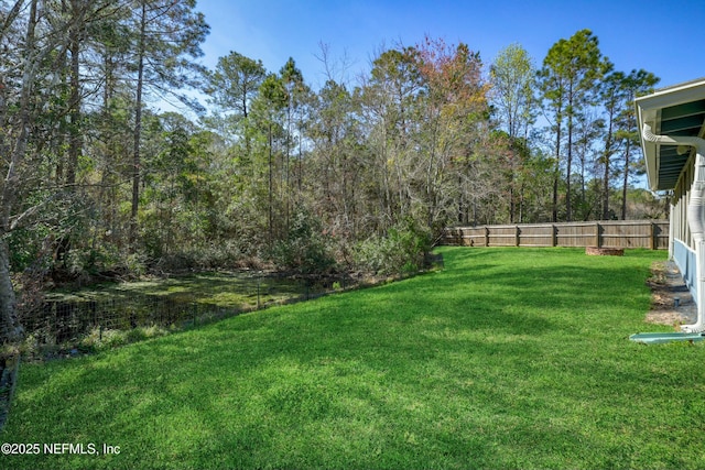 view of yard featuring fence