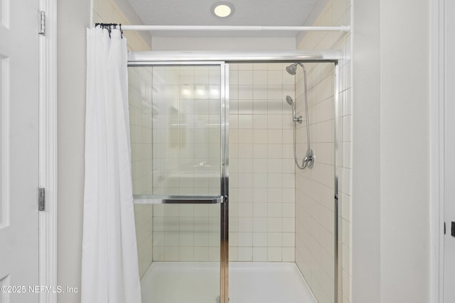 bathroom with a stall shower