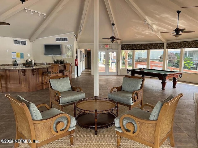 interior space featuring a ceiling fan, beam ceiling, visible vents, and french doors