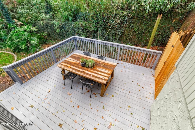 deck featuring outdoor dining space