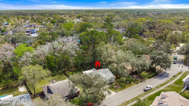 drone / aerial view with a view of trees