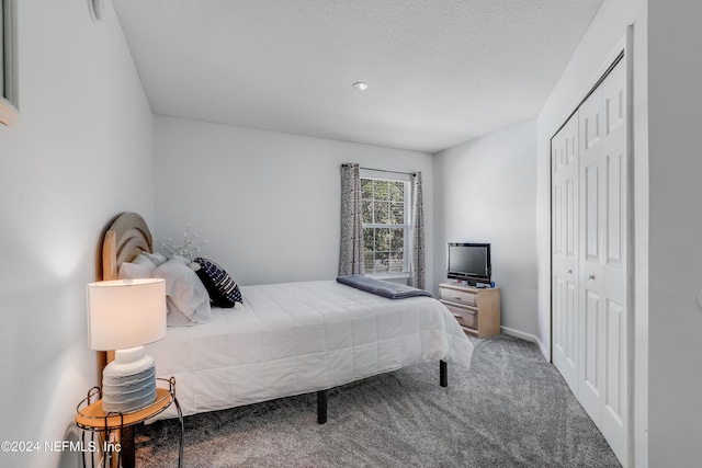 carpeted bedroom with a closet