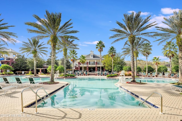 pool with a patio area