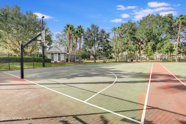 view of sport court featuring community basketball court and fence