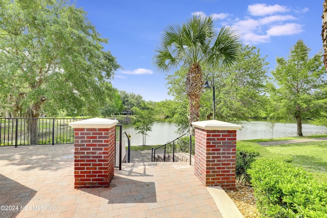 view of patio / terrace featuring a water view