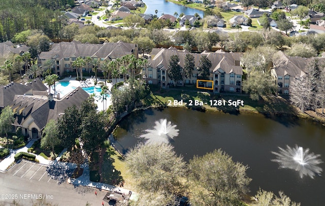 aerial view with a water view and a residential view