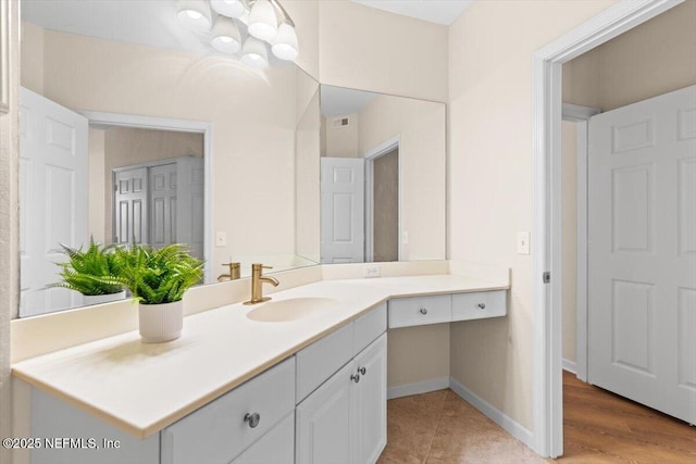 8539 Gate Pkwy W Unit 1723, Jacksonville, FL 32216 - bathroom featuring visible vents, baseboards, and vanity