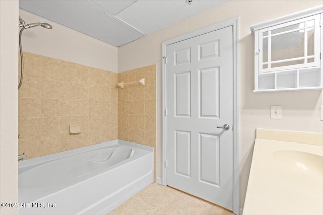 8539 Gate Pkwy W Unit 1723, Jacksonville, FL 32216 - bathroom featuring bathing tub / shower combination and tile patterned floors