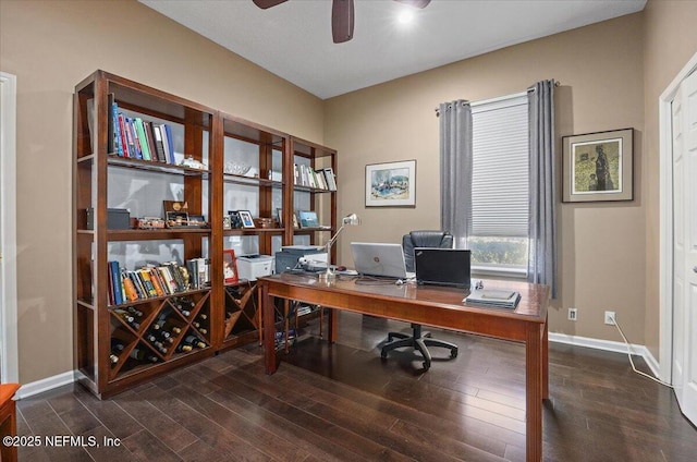 office area featuring baseboards, a ceiling fan, and wood finished floors