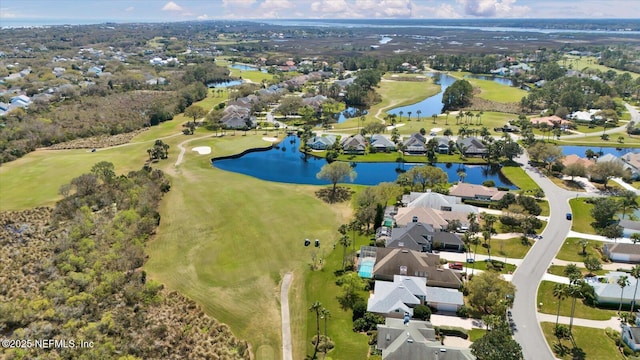 bird's eye view featuring a residential view, view of golf course, and a water view