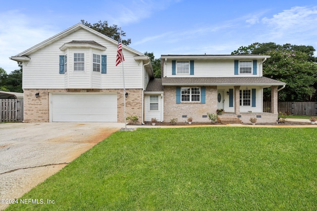 traditional-style home with crawl space, a front yard, fence, and brick siding