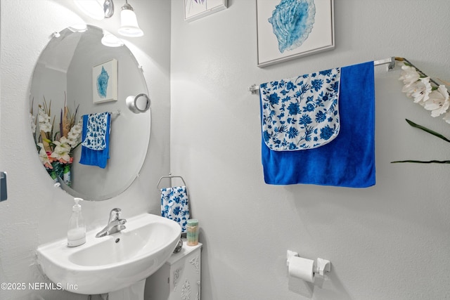 bathroom with a sink and visible vents