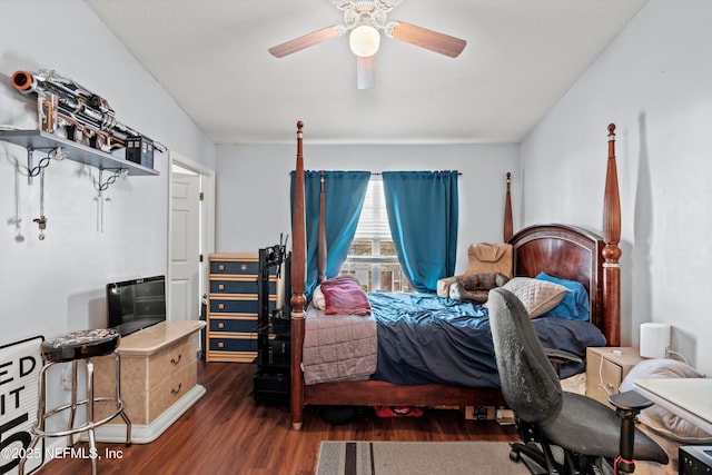 bedroom featuring a ceiling fan and wood finished floors