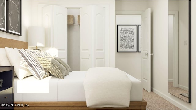 bedroom with a closet, carpet flooring, and baseboards