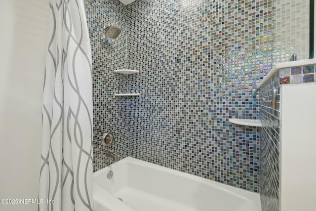 full bath featuring shower / tub combo with curtain