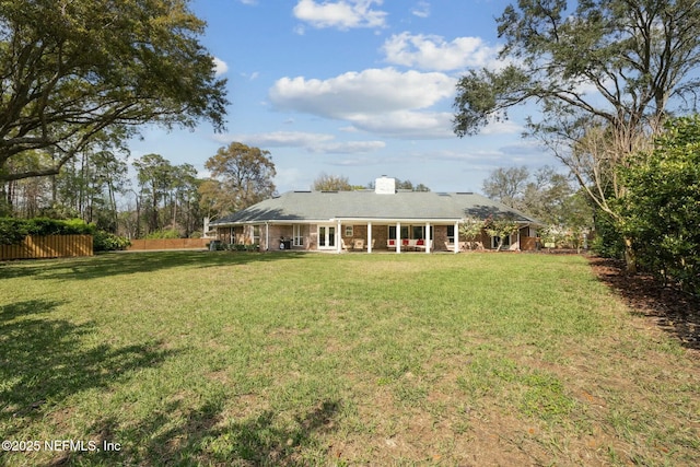 view of yard with fence