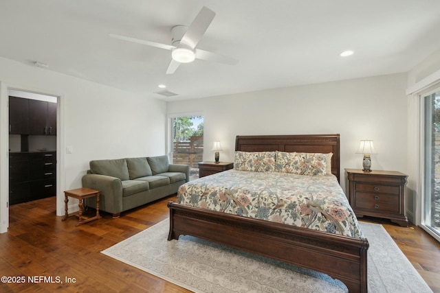 bedroom featuring visible vents, recessed lighting, a ceiling fan, and wood finished floors