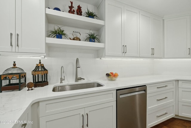 kitchen featuring a sink, open shelves, stainless steel dishwasher, and decorative backsplash