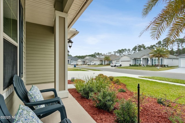 view of patio / terrace with a residential view