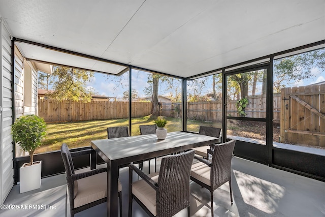 sunroom / solarium featuring plenty of natural light