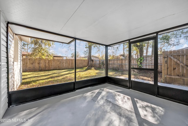 unfurnished sunroom featuring plenty of natural light