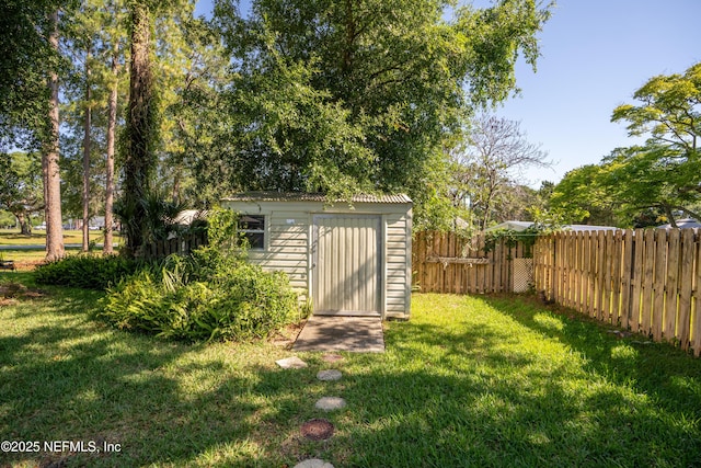 view of shed with fence