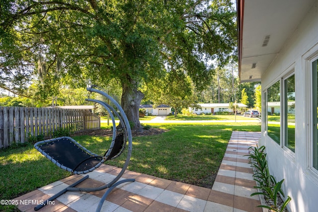 view of yard featuring fence