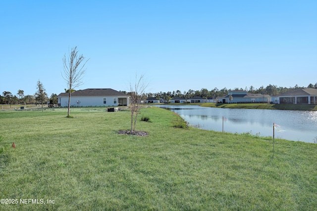 view of yard with a water view