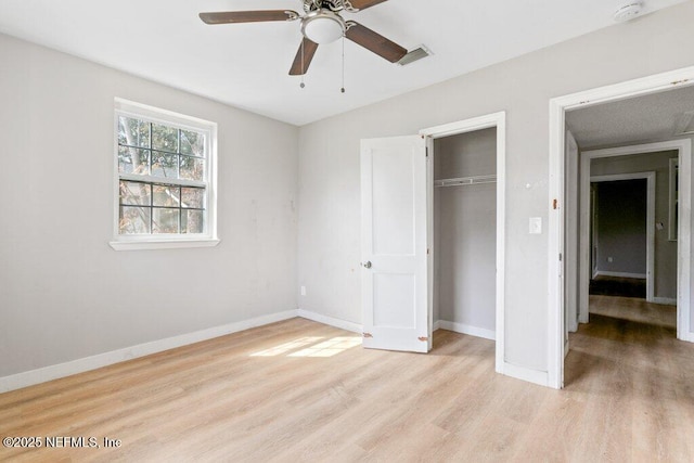 3135 Soutel Dr, Jacksonville, FL 32208 - unfurnished bedroom with light wood finished floors, baseboards, visible vents, and a closet