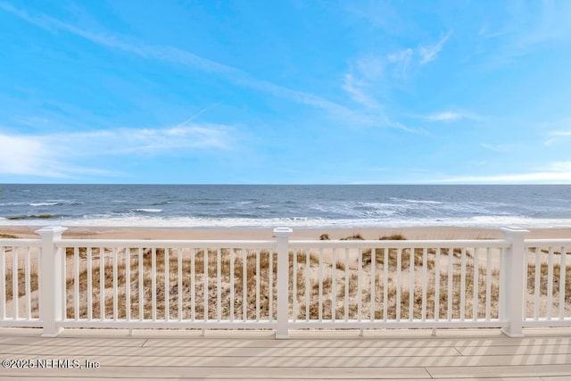 property view of water featuring a beach view