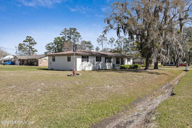 view of front of home with a front yard