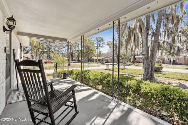 unfurnished sunroom featuring a wealth of natural light