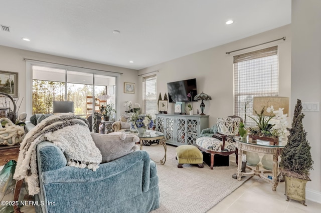 11334 Newtonian Blvd, Jacksonville, FL 32256 - tiled living room featuring baseboards, visible vents, and recessed lighting