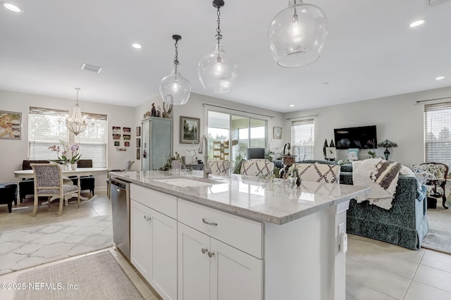11334 Newtonian Blvd, Jacksonville, FL 32256 - kitchen featuring a sink, visible vents, open floor plan, stainless steel dishwasher, and an island with sink