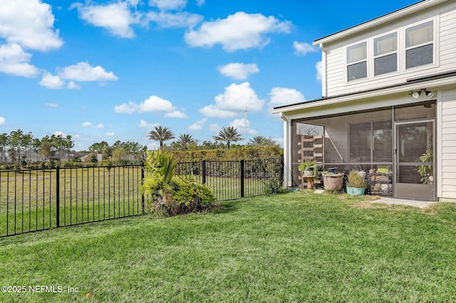11334 Newtonian Blvd, Jacksonville, FL 32256 - view of yard with a sunroom and a fenced backyard