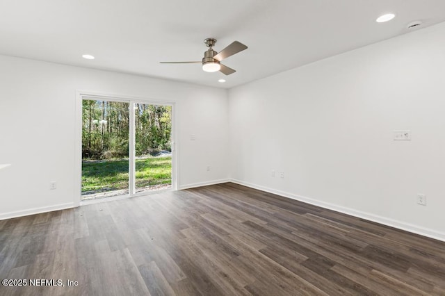 empty room featuring baseboards, ceiling fan, dark wood finished floors, and recessed lighting