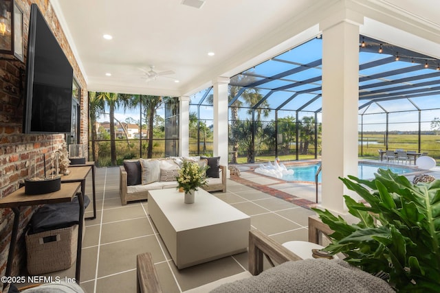 interior space featuring a ceiling fan and a wealth of natural light