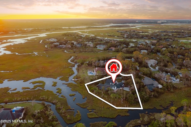 view of aerial view at dusk