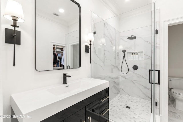 full bath featuring toilet, visible vents, a marble finish shower, and ornamental molding