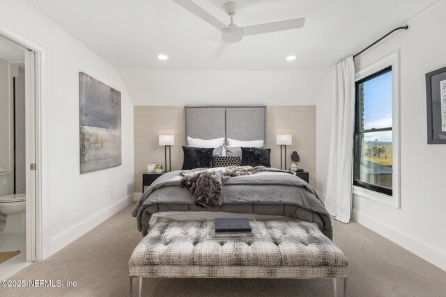 bedroom with carpet floors, recessed lighting, ensuite bath, and baseboards