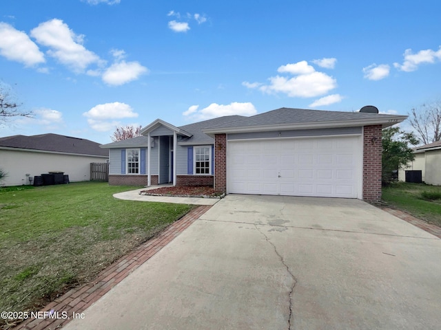 single story home with a garage, driveway, a front lawn, and brick siding