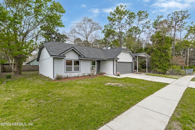 ranch-style house with driveway, a shingled roof, an attached garage, fence, and a front yard